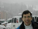 Steve in snowy parking lot at base