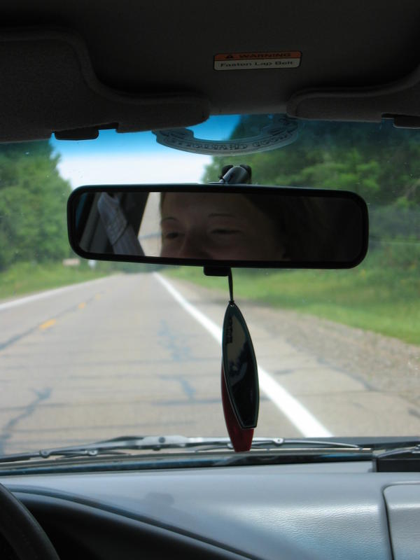 Rear-view reflection of Amanda
